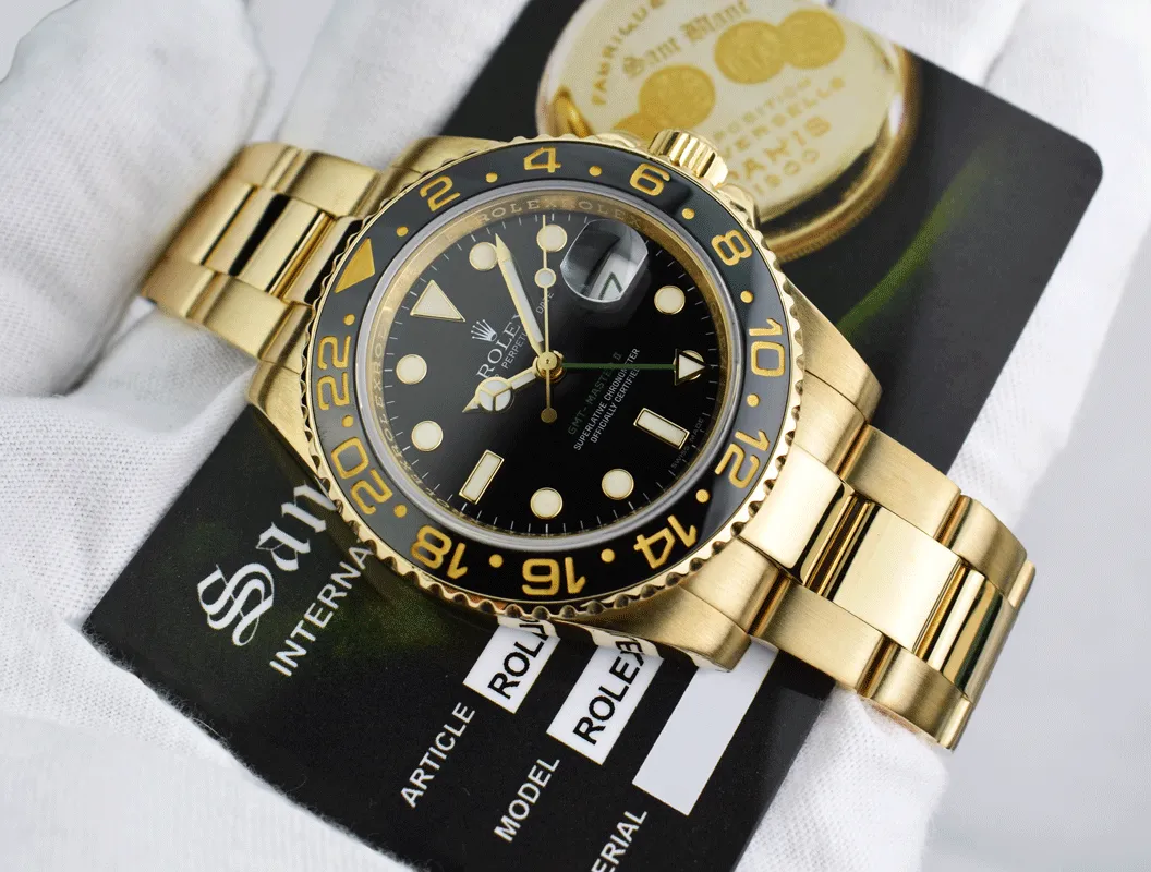 ROLEX 18kt Yellow Gold GMT Master II Black Dial Model 116718