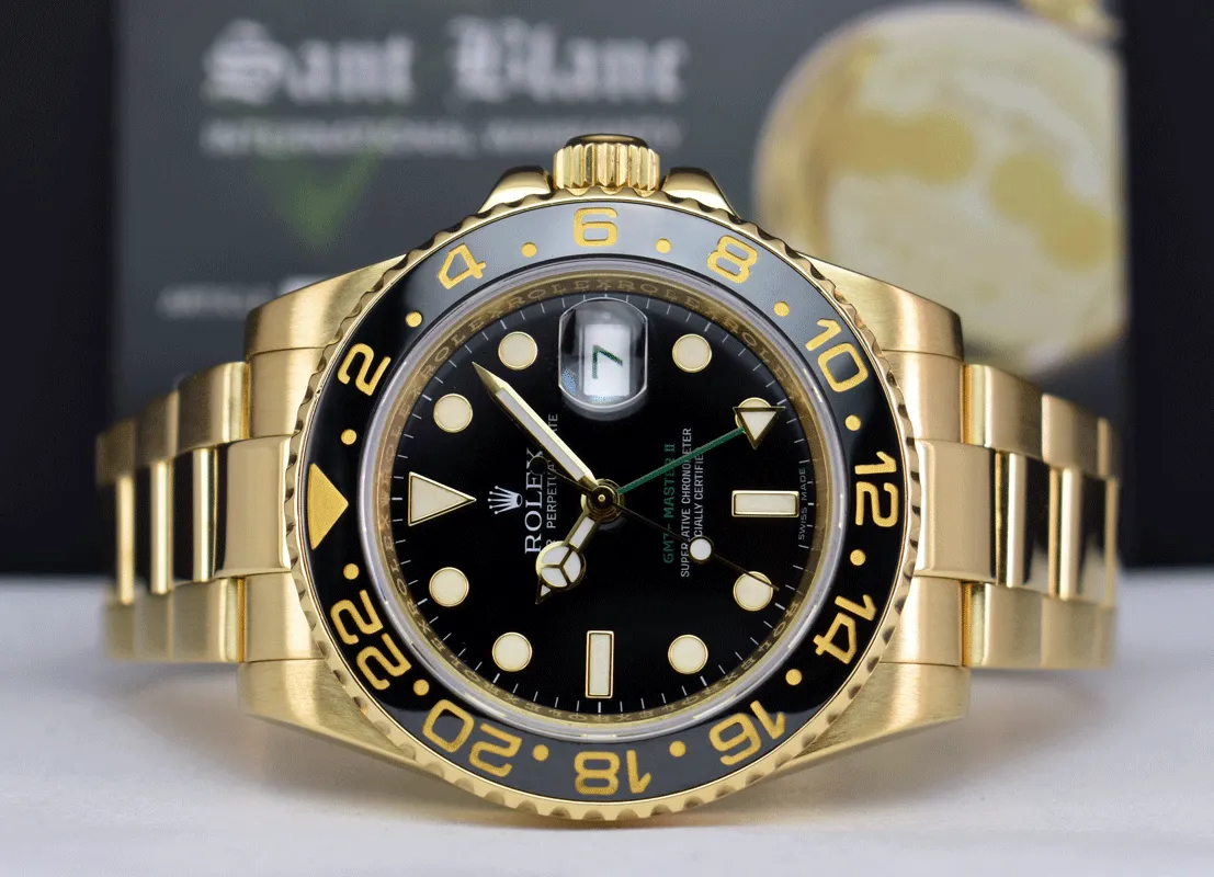 ROLEX 18kt Yellow Gold GMT Master II Black Dial Model 116718